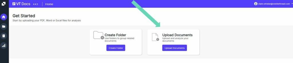 An arrow pointing to the upload documents button in VT Docs.